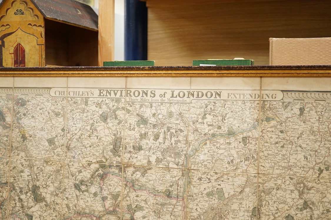 After George Frederick Cruchley (1797-1880), ‘Cruchley’s Environs of London extending 30 miles from the metropolis, 1828’, a folding map backed on linen, now framed, 92 x 95cm